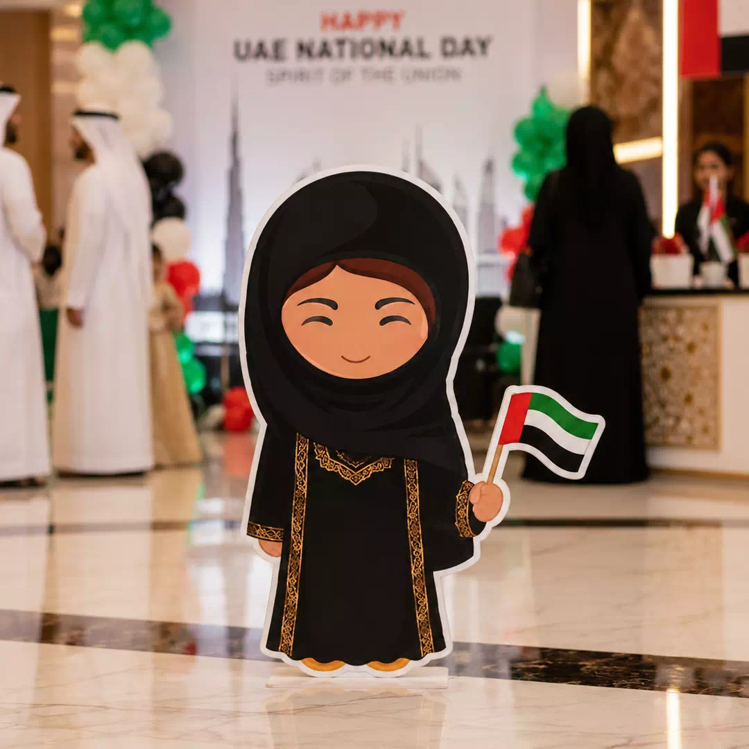 Illustrated Emirati Girl in Traditional Black Abaya with UAE Flag Character Cutout - Image 2